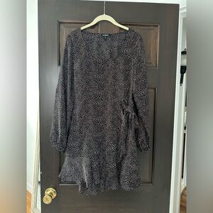 Mini black dress with red and white dots. Great for a holiday party